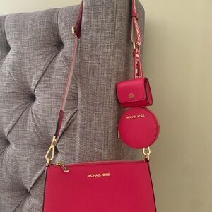 Michael Kors crossbody tech and matching wallet